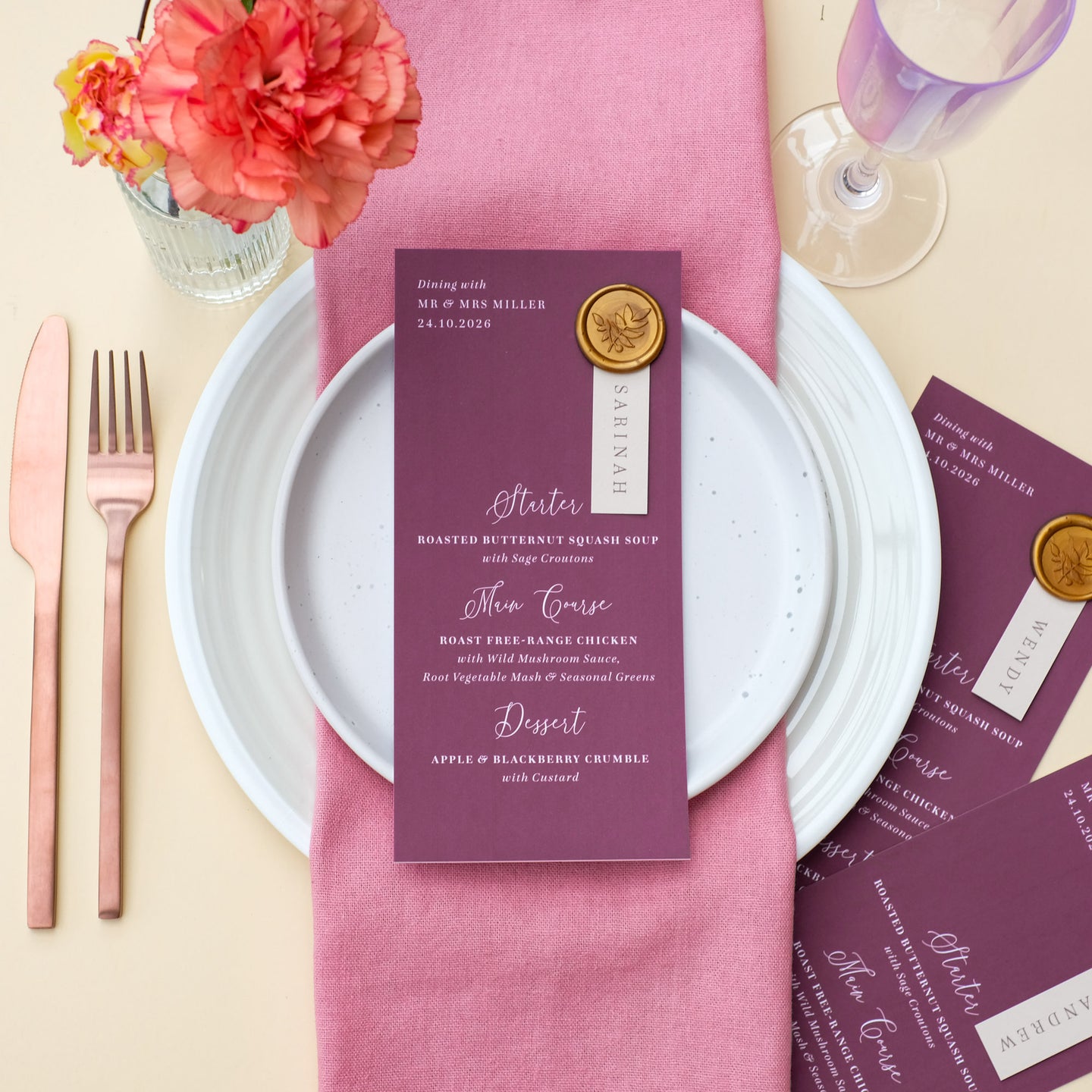 burguny wedding menu with guest name and wax seal